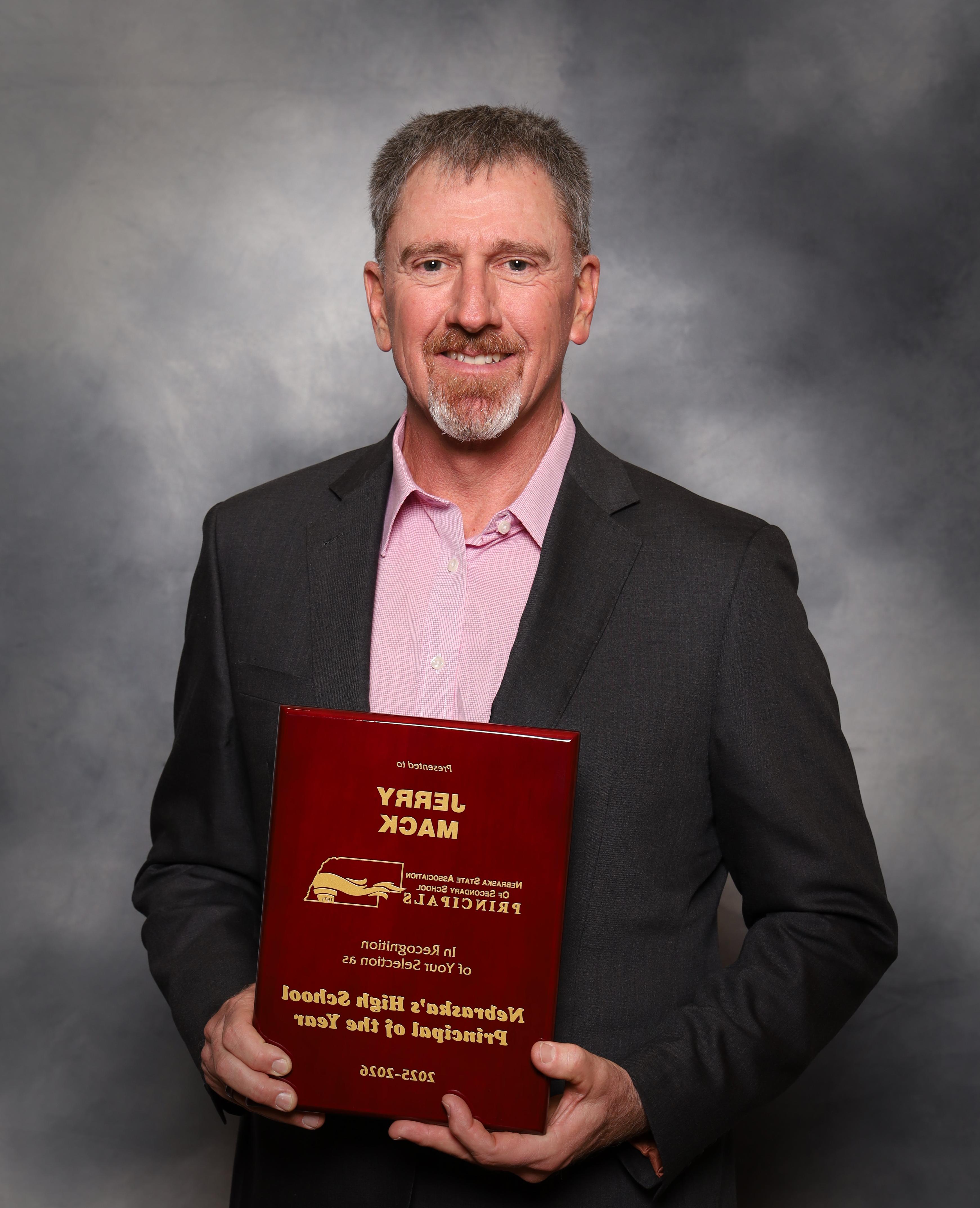 Jerry Mack with award